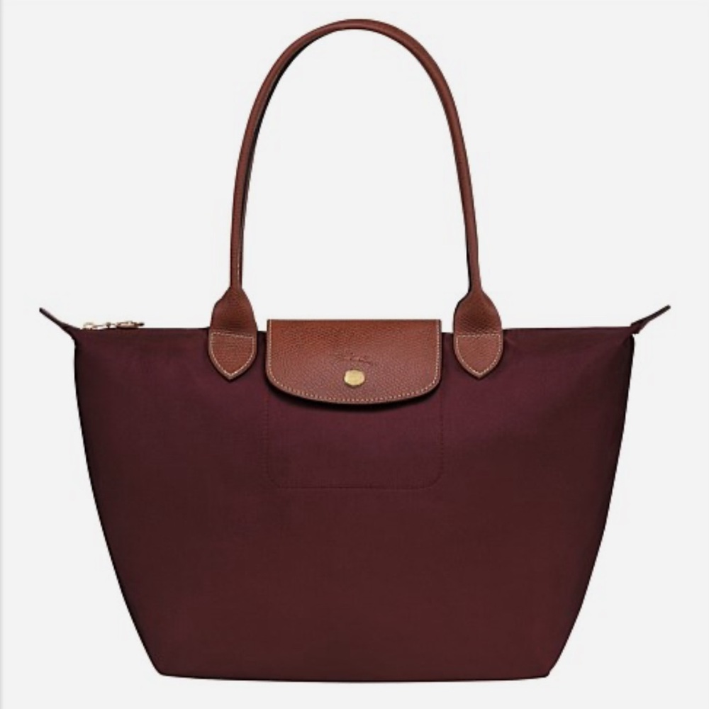 Longchamp le pliage foldable tote bag in burgundy.